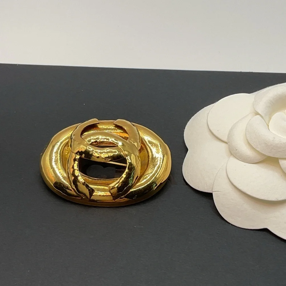 Chanel Gold Tone CC Logo Brooch